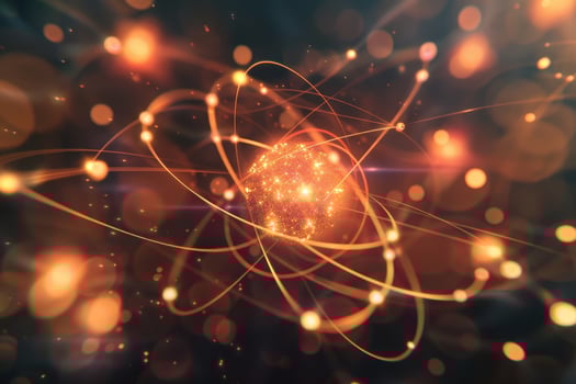 Energetic particles dance around the nucleus of an atom, creating a dynamic and colorful representation of atomic structure against a dark background filled with cosmic elements photo