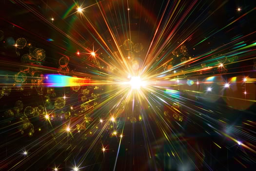 A bright light with many stars surrounding it photo