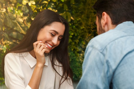 First Date. Pretty Girl In Love Laughing Flirting With New Boyfriend Sitting In Cafe. Selective Focus photo