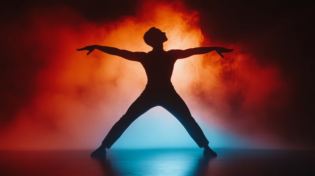Silhouette of a Dancer Posing in Red and Blue Smoke photo