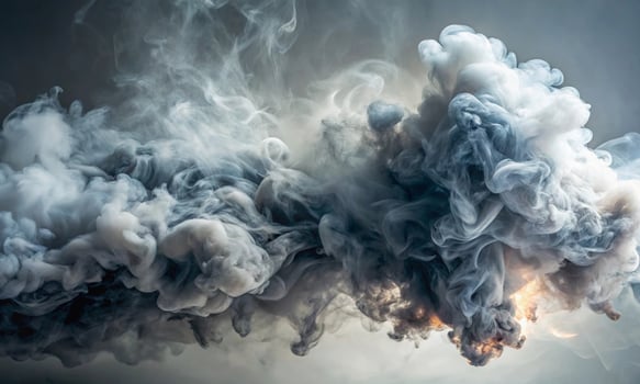 Thick grey smoke spreads over a neutral background photo