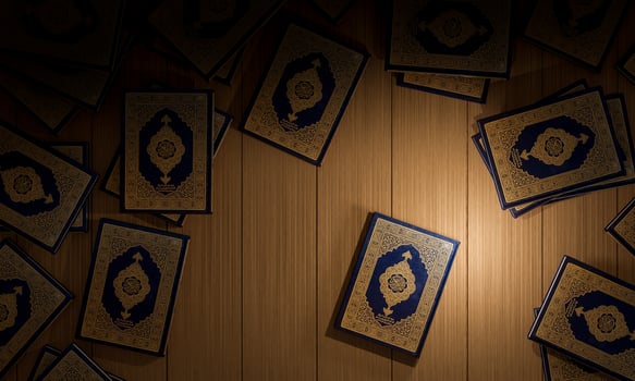 3d, Many Qurans on the wooden table, Islamic concept - The Holy Al Quran with written Arabic calligraphy meaning of Al Quran, photo