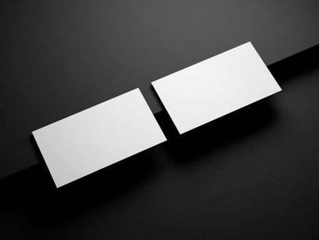 Business card on black background photo