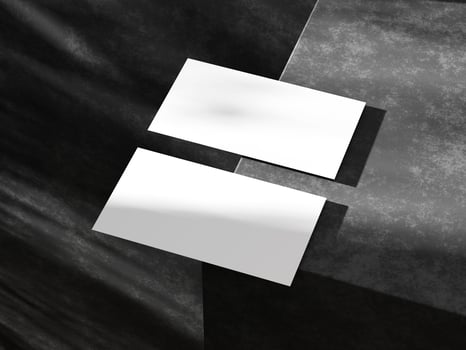 Business card on black background photo