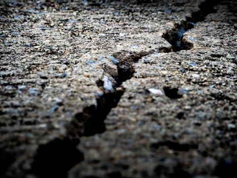 Cracked and separated of concrete floor photo