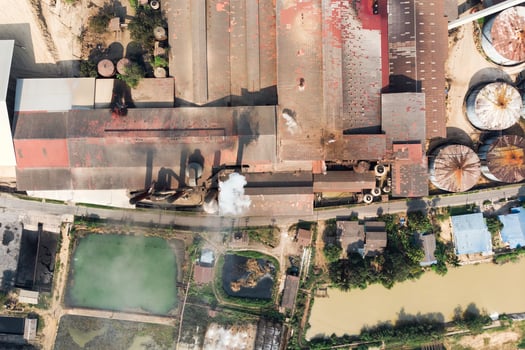 Industry factory manufacturing with emission smoke from chimneys photo