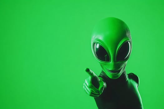 Playful green alien pointing at the viewer against a bold neon green background for a whimsical touch photo