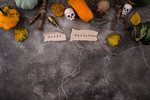 Halloween composition with skull and pumpkins photo