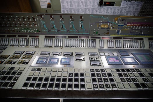 Control room. Large Industrial control panel inside factory or power plant photo