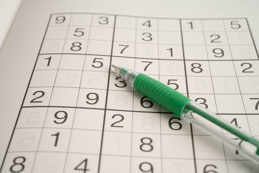Sudoku puzzle, game to play for keep you brain younger for developing Alzheimer disease in senior patient. photo