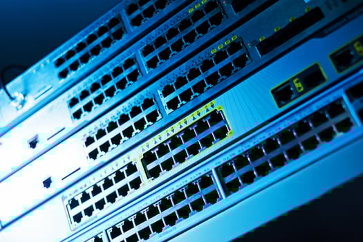A close up of a network switch with multiple ports photo