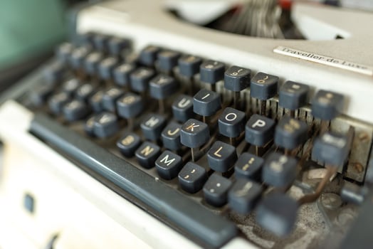Old typewriter, close-up, shallow depth of field. photo