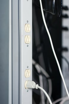 Wires plugged into power bar photo