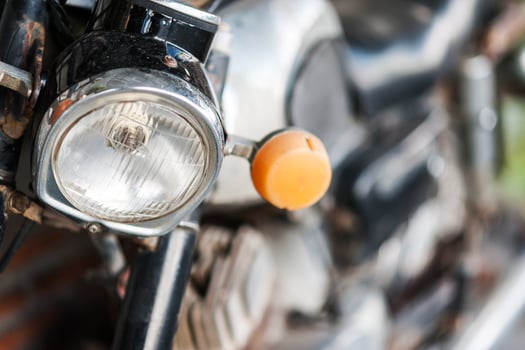 Old motorcycle in vintage place photo