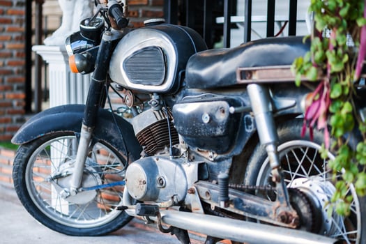 Old motorcycle in vintage place photo