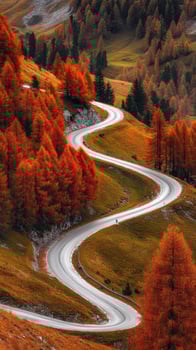 Winding road through vibrant autumn foliage in the mountains photo