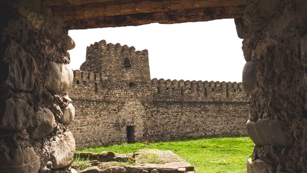 Ancient fortress stone walls in country of Georgia history ruins photo