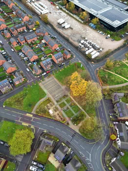 Aerial View of Manchester City During Autumn Season and Cloudy Day over England Great Britain. High Angle Drone's Camera Footage was Captured on October 29th, 2024 photo