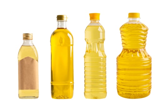 Vegetable oil in different bottle for cooking isolated on white background. photo