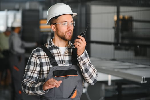 Factory worker. Man working on the production line photo