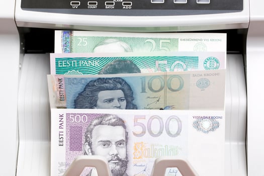 Estonian kroon in the counting machine photo