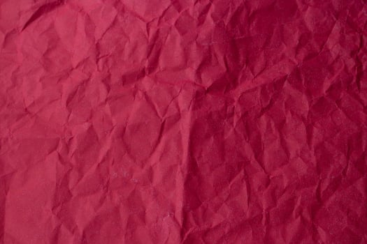 Background of crumpled red paper photo