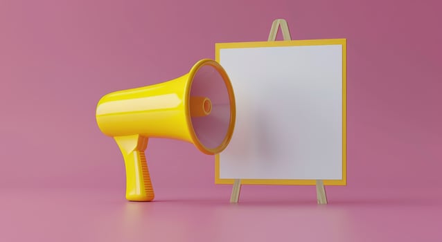 Yellow Megaphone and Blank White Sign on Pink Background photo