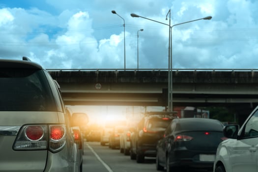 Luxury of car stop on the road junction by traffic light control in across. Traveling in the provinces during the bright period. Open light brake. Concrete bridge crossing level intersection. photo