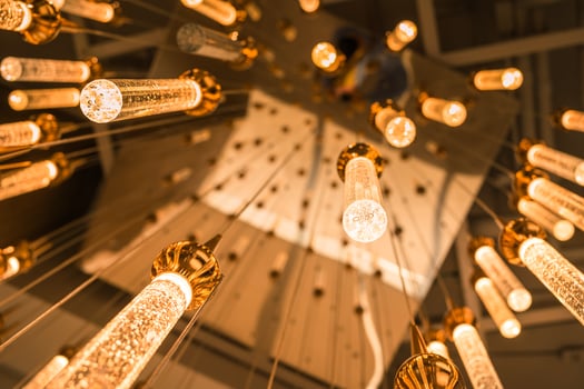 Close up of crystal on the chandelier. Luxury crystal chandelier. Abstract background. photo
