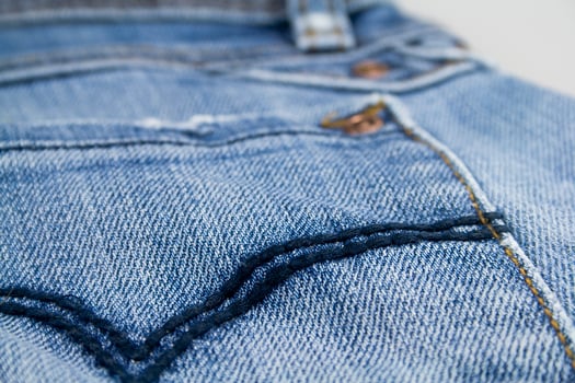 blue jeans on white photo