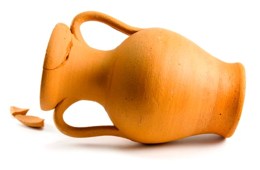 broken amphora on white photo