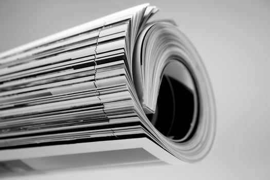rolled up magazine photo
