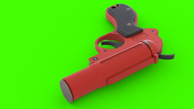 a red gun on a green background 1 photo