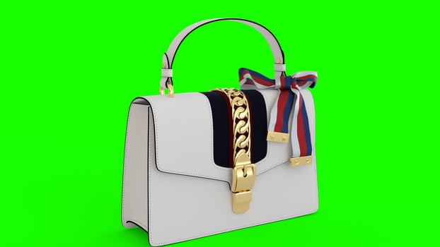 stylish white ladies purse with green background 2 photo
