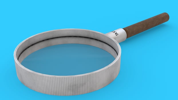 magnifying glass with blue background photo
