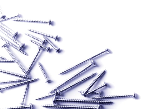 metal screws on white photo