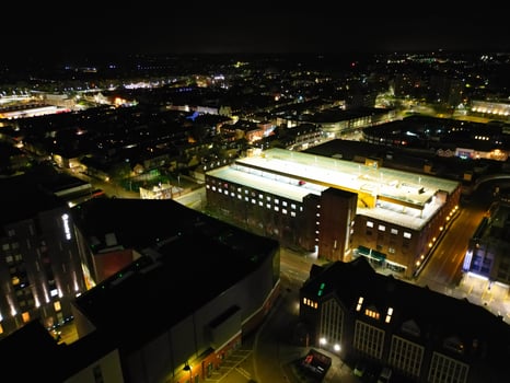 Illuminated Central Bedford City of England United Kingdom During Night. April 5th, 2024, High Angle Footage Was Captured after Sunset and Beginning of Night with Drone's Camera photo