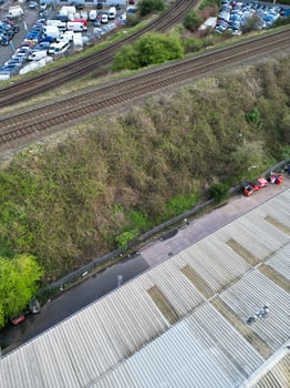 Aerial View of Residential District at Birmingham City of Midlands, England, United Kingdom. Drone Camera Footage was Captured from High Altitude During Sunset Time of March 30th, 2024. photo