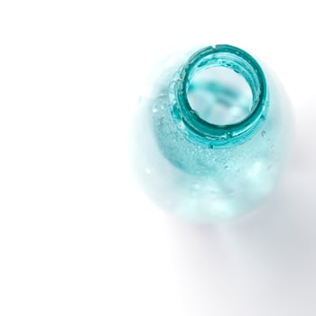 bottle with water drops photo