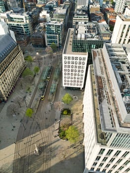 Iconic Buildings at Central Greater Manchester City Centre and Tall Buildings During Golden Hour of Sunset over England UK. Aerial Footage Was Captured with Drone's Camera on May 5th, 2024. photo