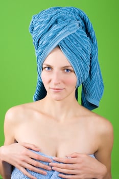 young woman in blue towel photo