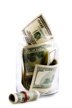 money in glass jar photo