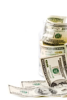 money in glass jar photo