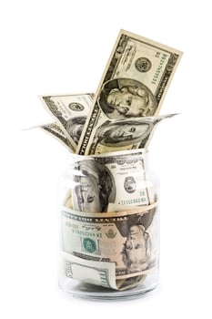 money in glass jar photo