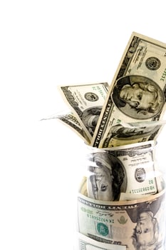 money in glass jar photo