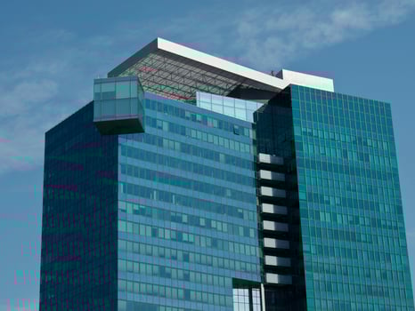 A tall building with windows in vienna photo
