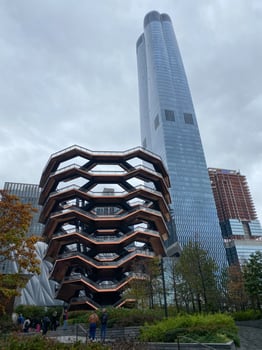 The building is made of wood and has a large tower photo