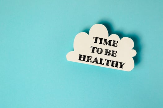 A cloud with the words Time to be healthy written on it photo