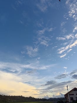 blue sky and floating clouds photo