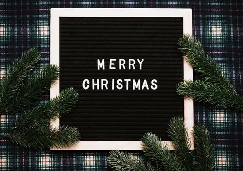 Merry Christmas message on an old vintage letter board. Top view. Flatley. Ready-made Christmas greeting card. photo